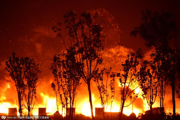 Explosions in China's Tianjin port area kill 17