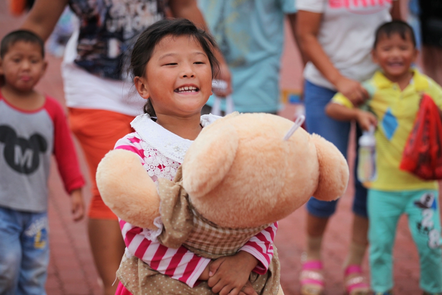 Goodbyes and tears as left-behind children head home