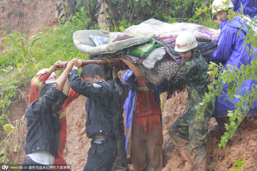 Eleven killed as rainstorm triggers landslide in SW China