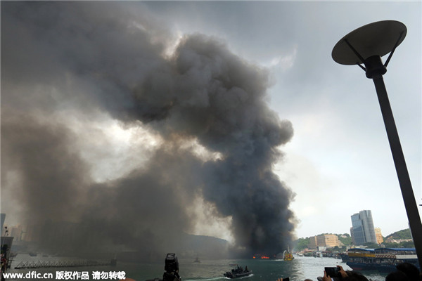 Huge fire sweeps through vessels in Hong Kong's Victoria Harbour