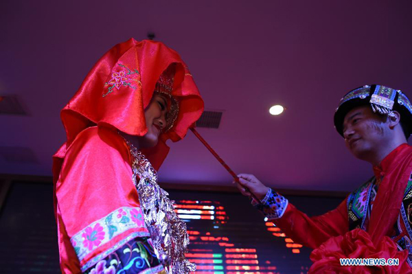 Young Miao couple get married in traditional way