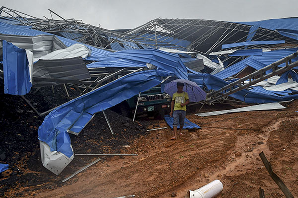 Typhoon leaves trail of death and mayhem