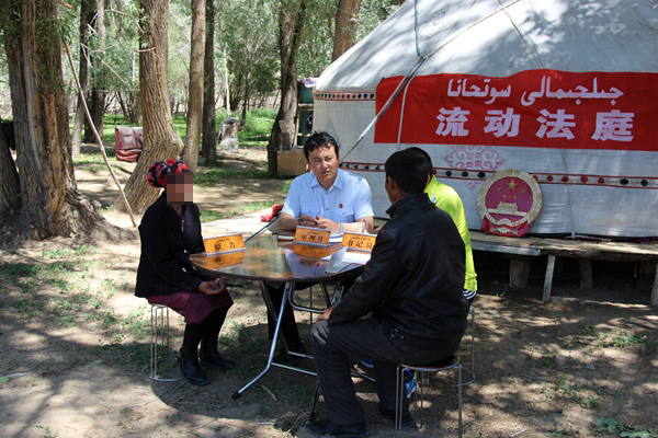 Kazakh judge goes the extra mile to help ethnic villagers