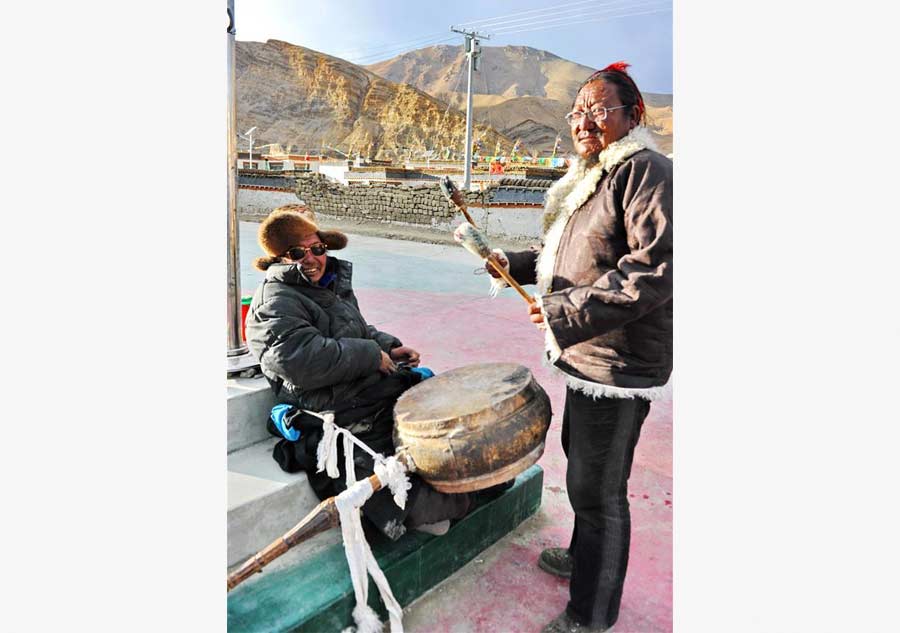 Villagers gather to dance 