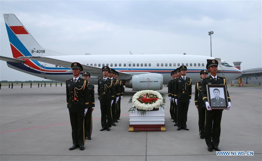 Chinese peacekeeper's body cremated