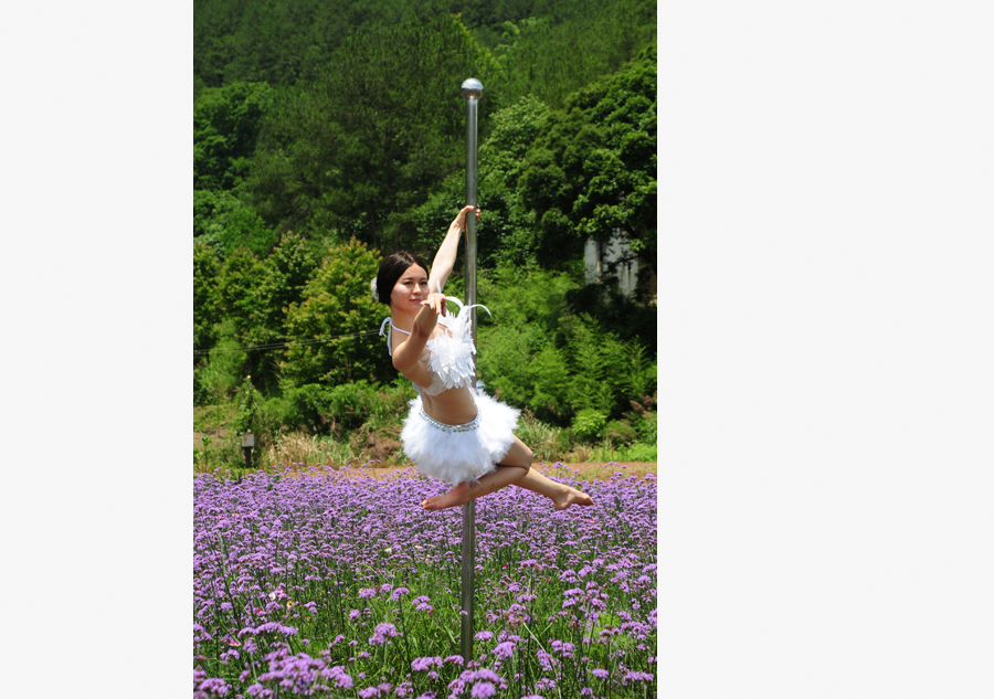 Pole dancing in sea of flowers