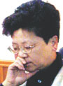 Top Chinese economic fugitive to return after 13 years for medical treatment