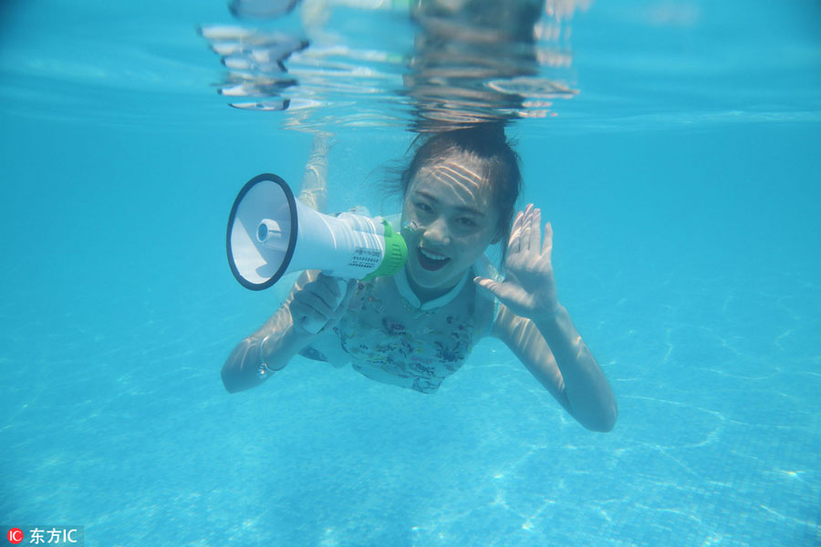 Underwater show cheers for Olympians