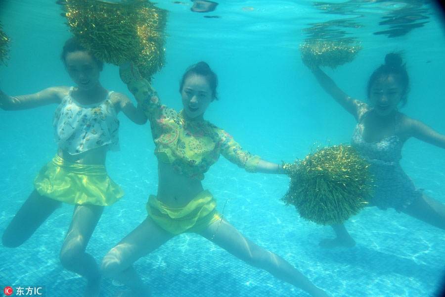 Underwater show cheers for Olympians