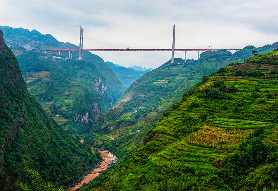 Main span of highest bridge completed in SW China