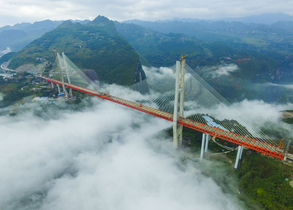 Sections linked up on world's highest bridge in Southwest China