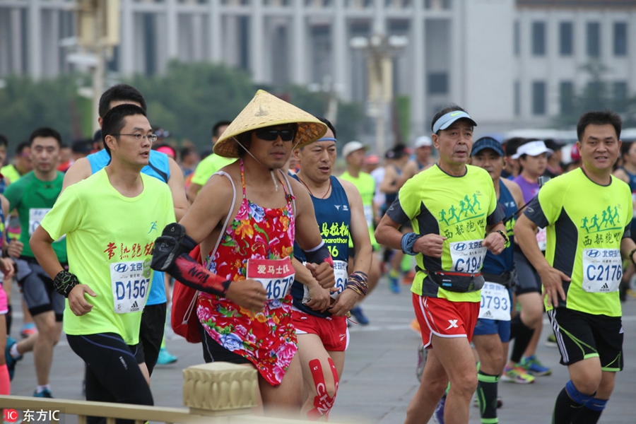 Runners compete during Beijing marathon