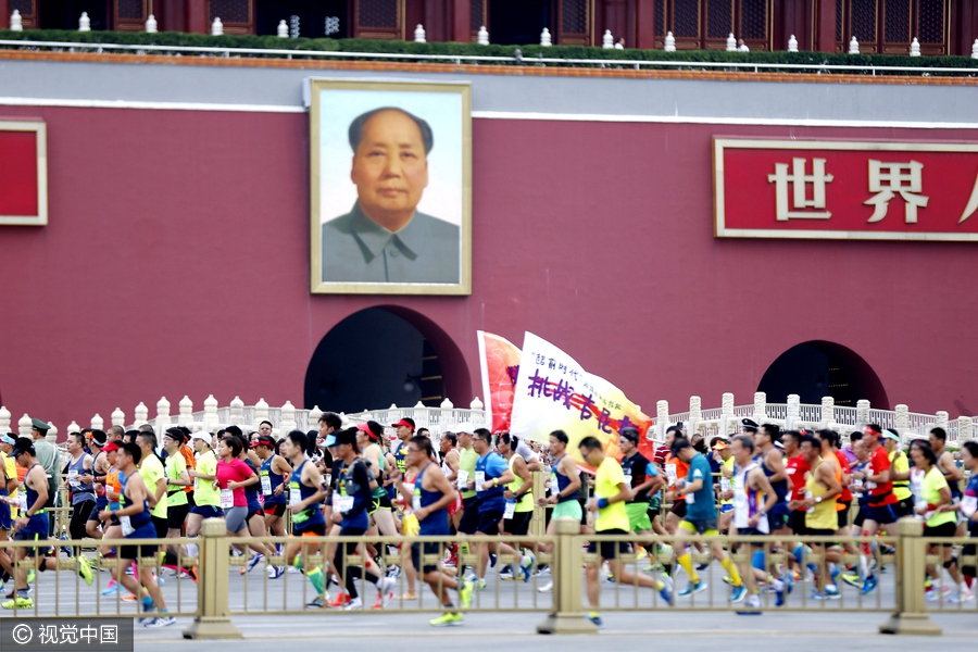 Runners compete during Beijing marathon