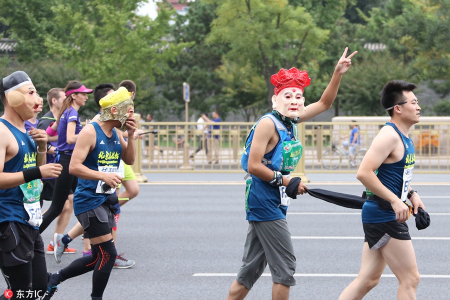 Runners compete during Beijing marathon