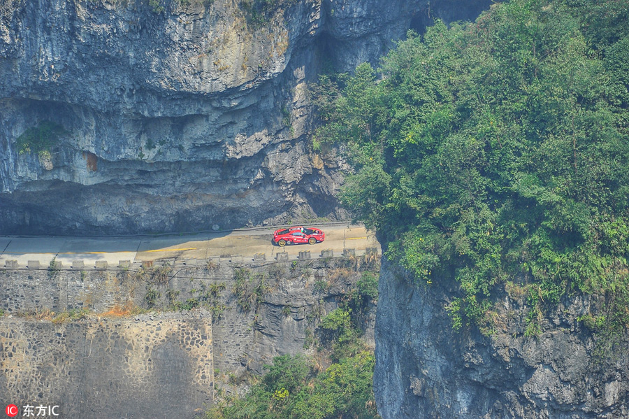 Italian sets new record with Ferrari on China's 'miracle road'