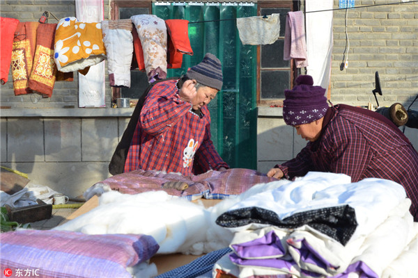 Grannies keep Tibetan children warm with hand-made clothes