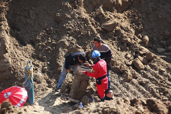 Racing to rescue boy trapped in North China