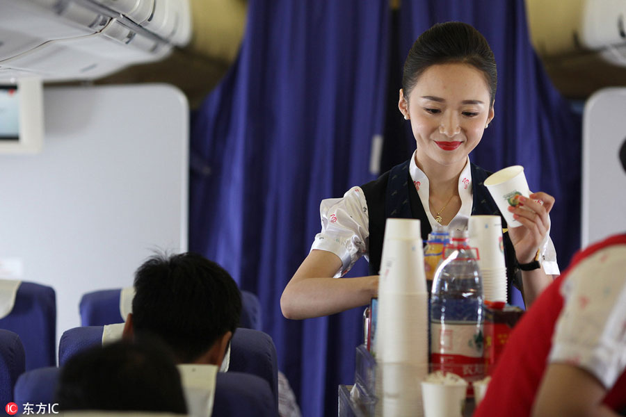 World's most beautiful stewardess: Serving passengers with smile