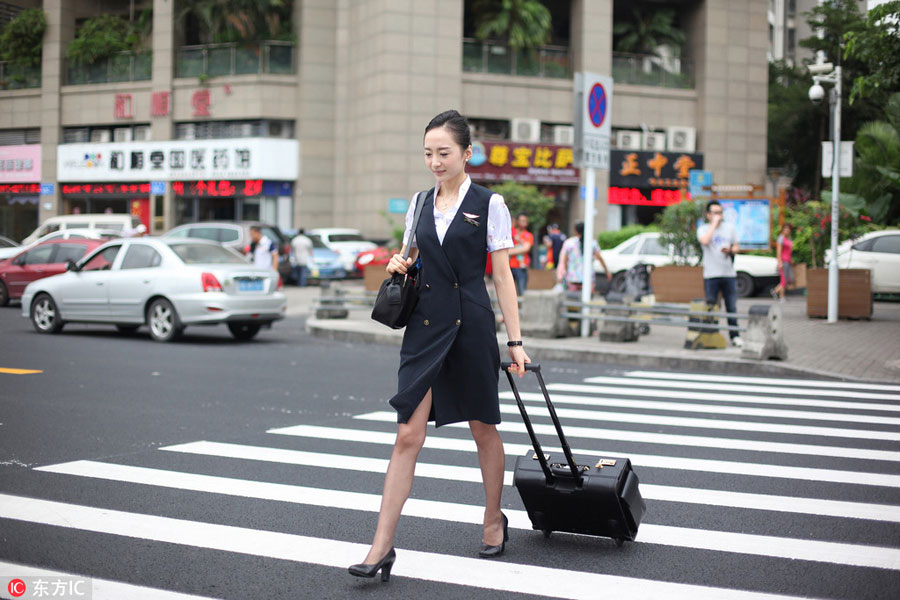 World's most beautiful stewardess: Serving passengers with smile