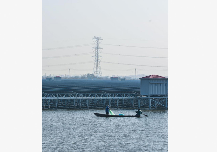 Solar power project under construction above fishery water