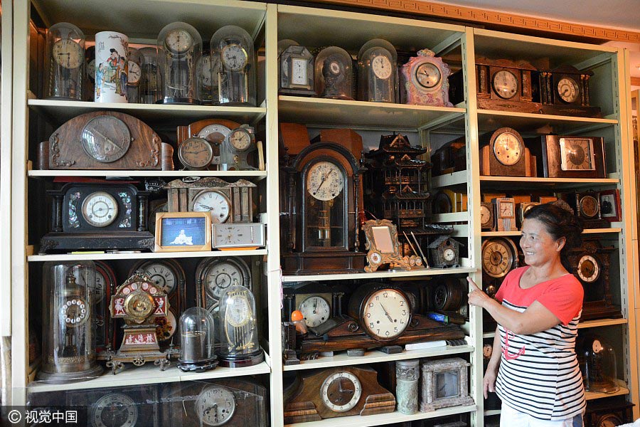 Thousands of clocks decorate old couple's home in Northeast China