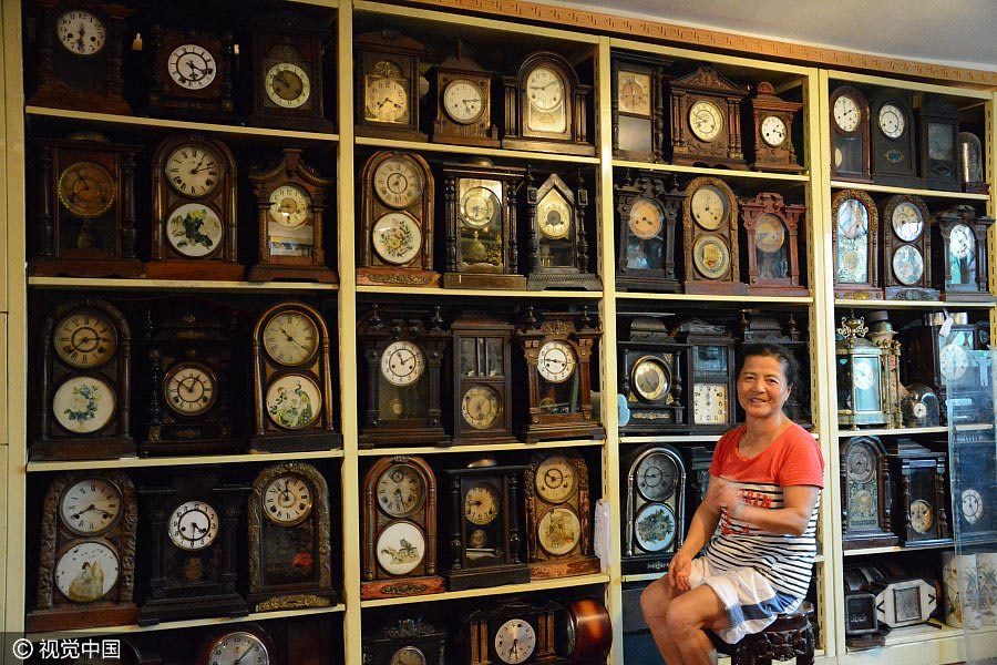 Thousands of clocks decorate old couple's home in Northeast China