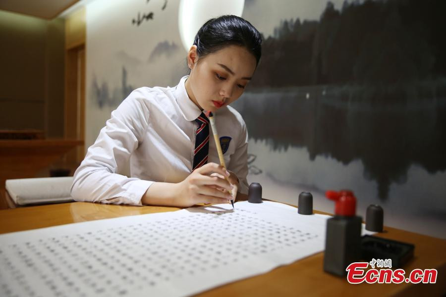 Girl hand-writes Buddhist text as Mother's Day gift