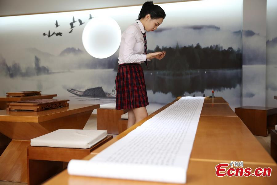 Girl hand-writes Buddhist text as Mother's Day gift