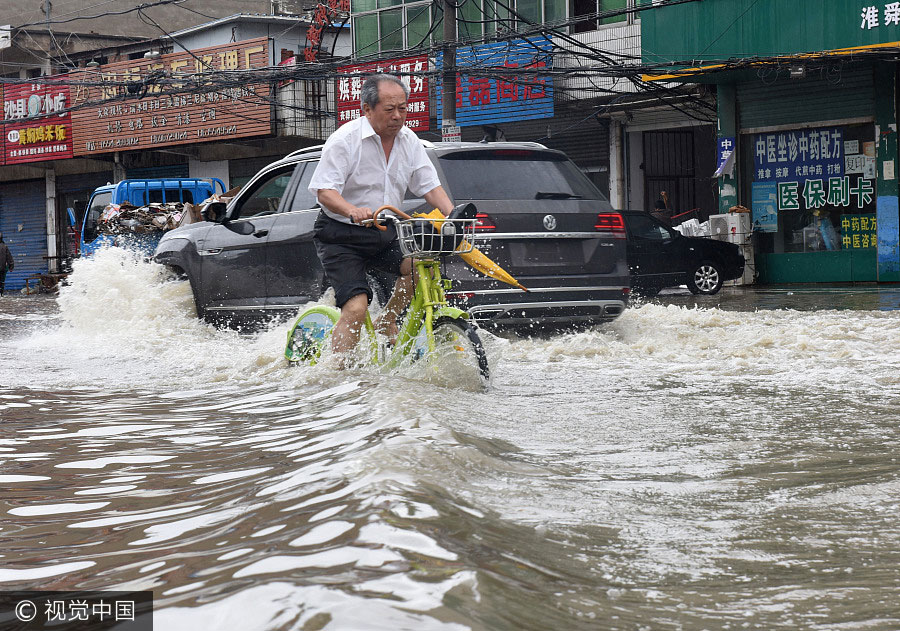 Torrential rain leaves six dead, three missing in China