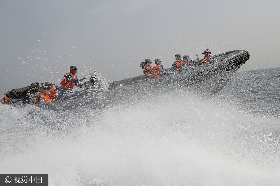 Navy sailors tie knot in middle of sea