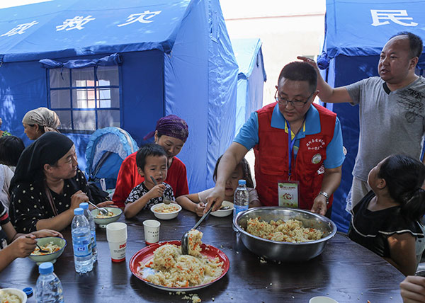 In Xinjiang, new houses 'saved lives'