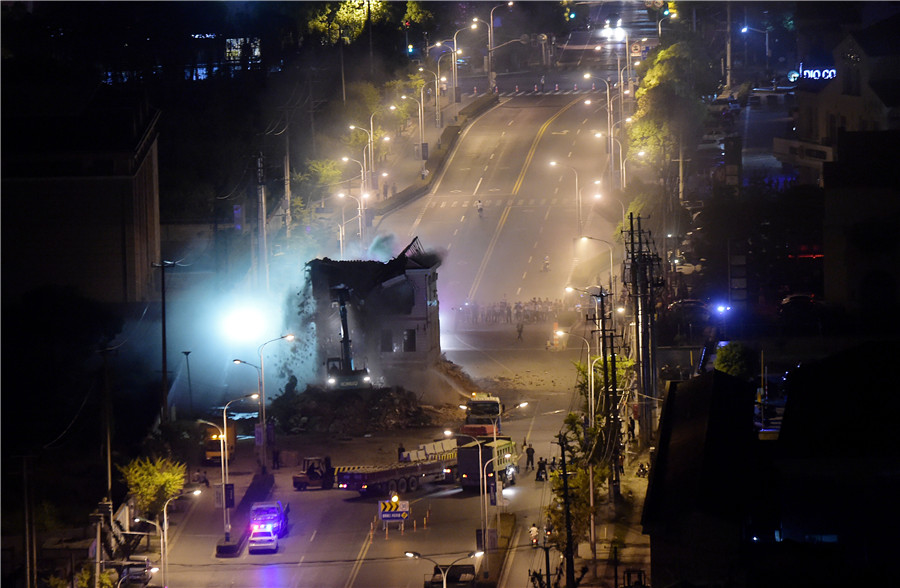 Shanghai house in road torn down after 14-year battle