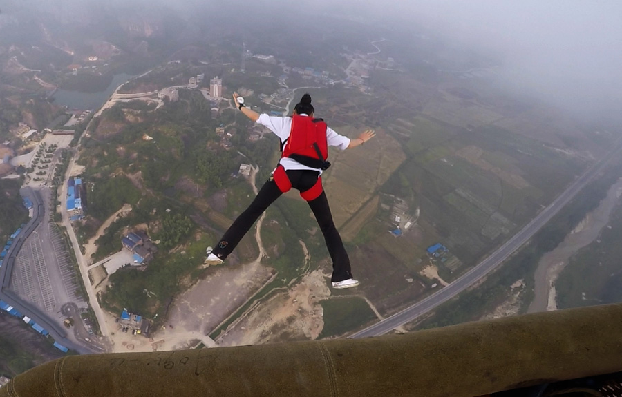 Chinese female BASE jumper leaps off hot air balloon