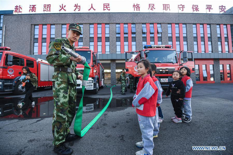 Children attend fire-fighting educational activity in E China