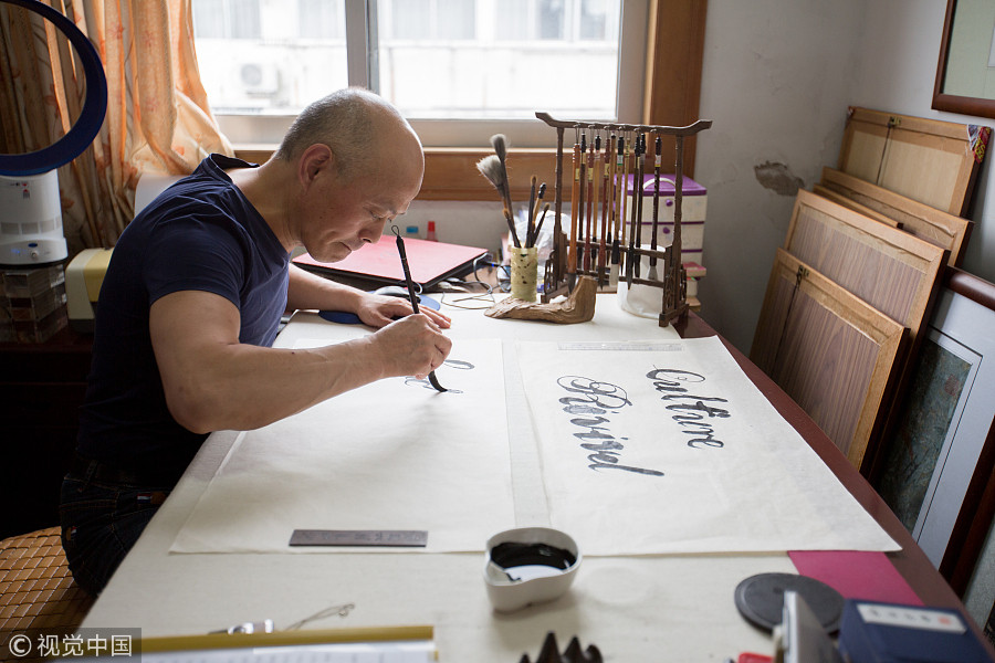 Man who loves writing English words with brush pen