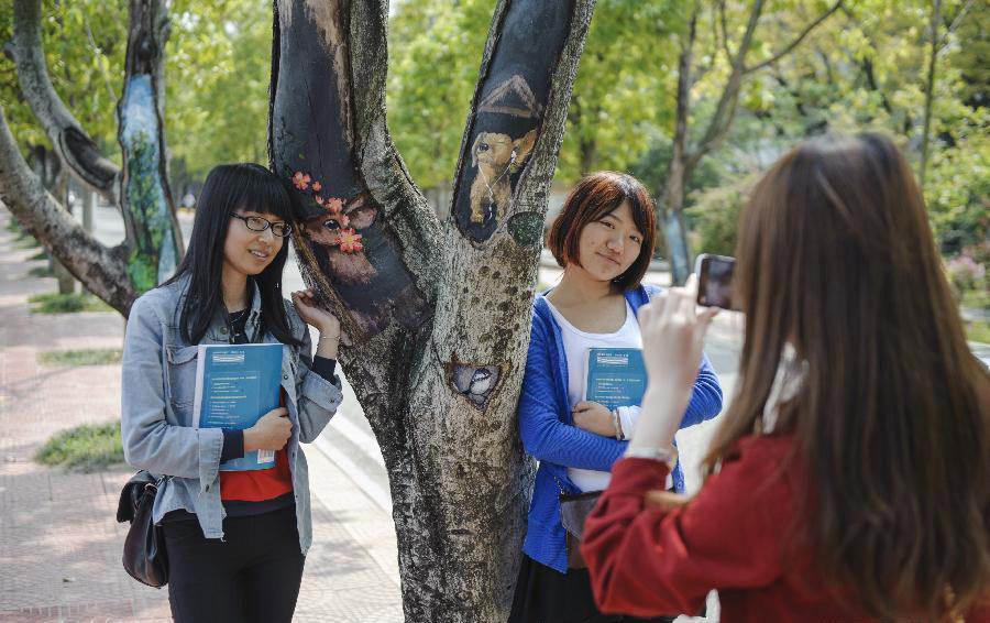 Tree hollow paintings brighten university campus