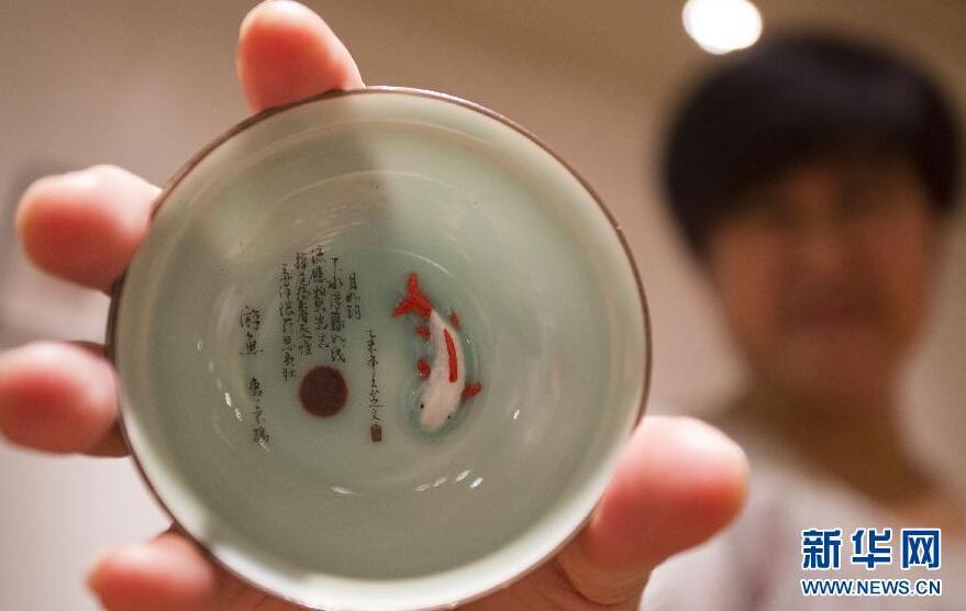 Miniature calligraphy on porcelain displayed in Canada