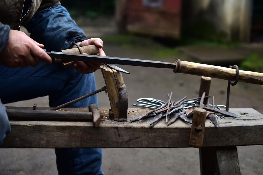 Craftsman makes scissors in traditional way