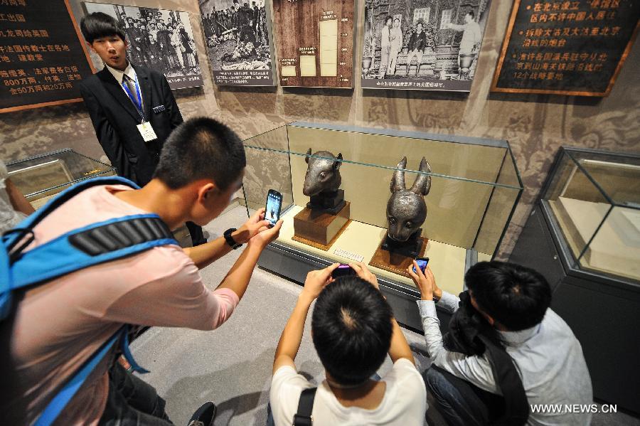 Rat, rabbit head sculptures on display