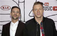 Macklemore & Ryan Lewis win best new artist, Beyonce opens Grammys