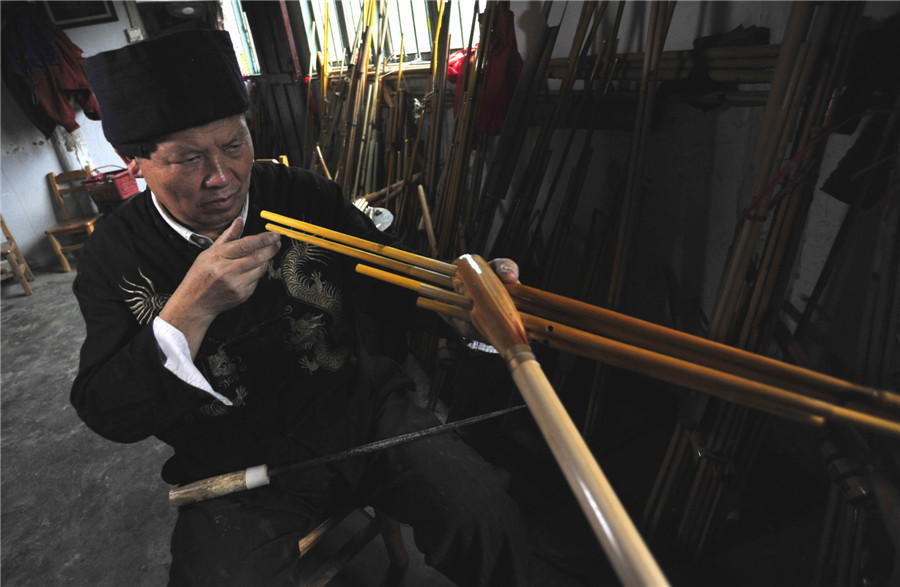 Inheritor of reed-pipe wind instrument 'Lusheng' in Guizhou