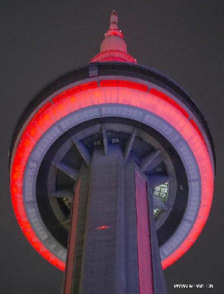 Toronto's CN Tower lights up to celebrate Chinese lunar New Year