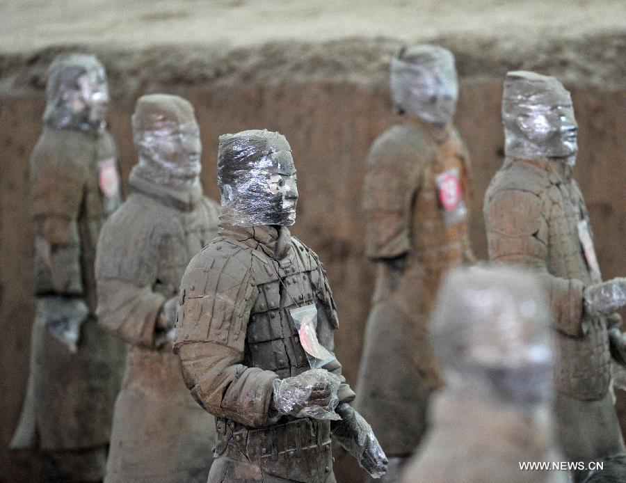 Terracotta warriors wrapped in cling film