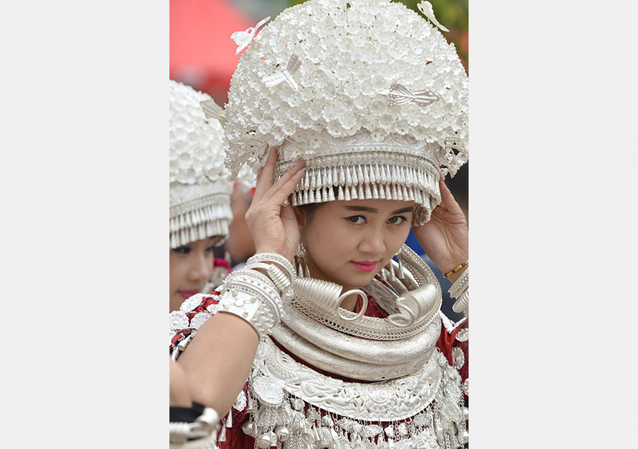 Dance and ethnic dresses mark Lusheng festival in SW China