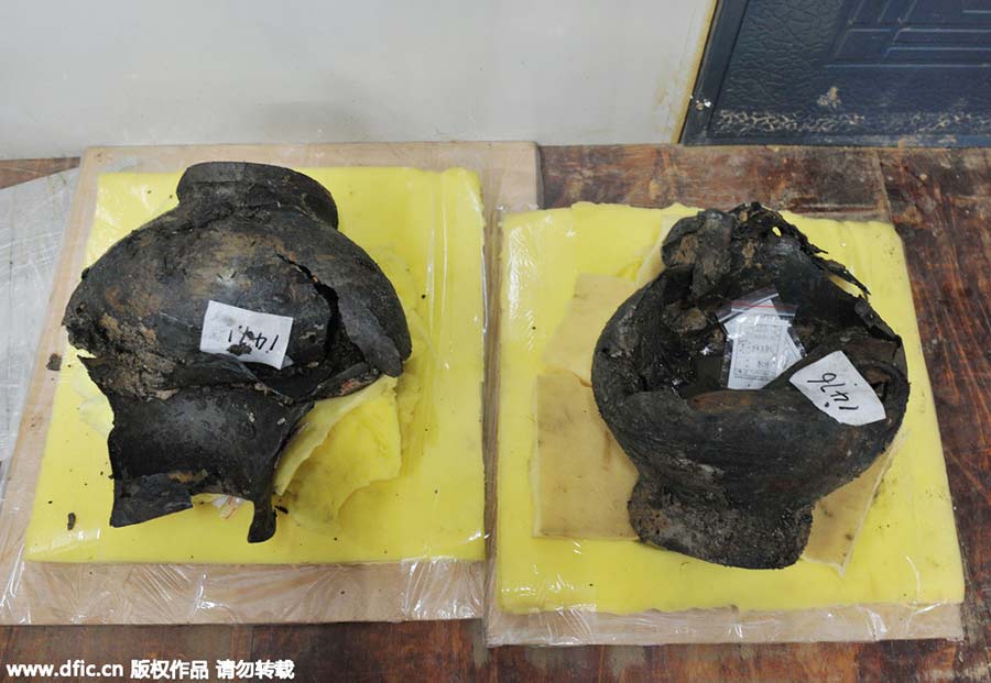 187 large gold coins found in 2,000-year-old tomb in Jiangxi