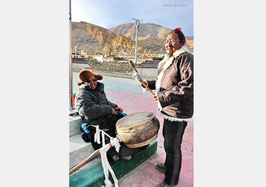 Villagers gather to dance 'Guozhuang' to celebrate Tibetan New Year