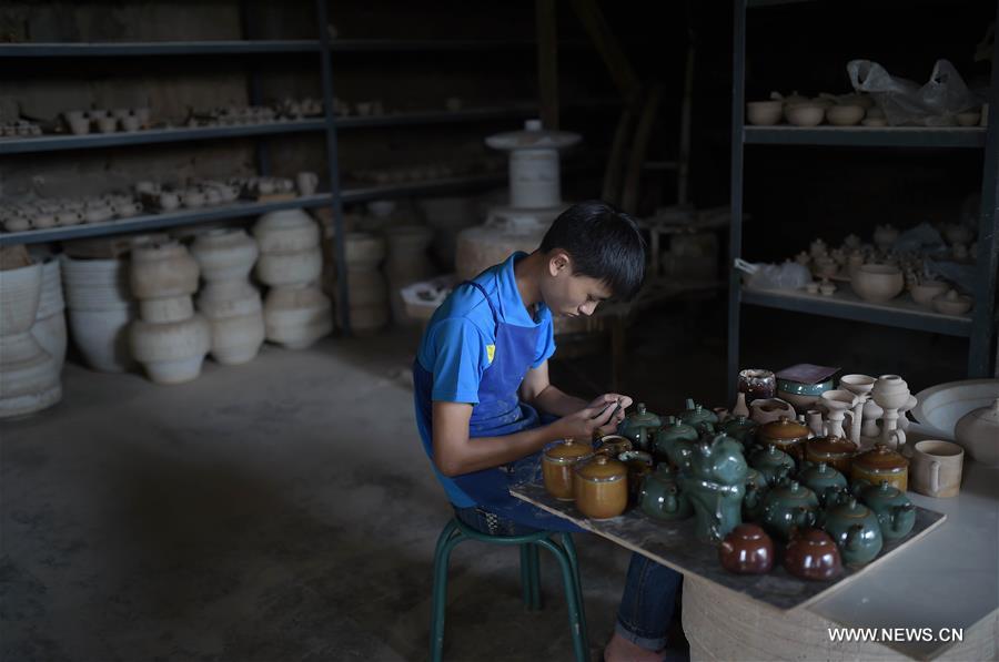 'Green' pottery: Intangible cultural heritage of Sichuan