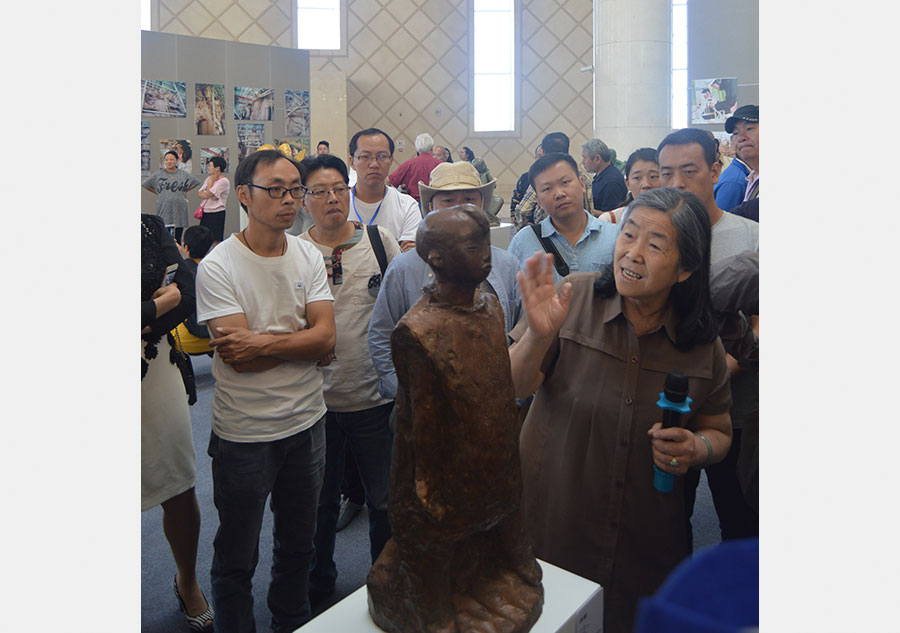 Sculptor He E's artworks highlight cultural expo in Ordos