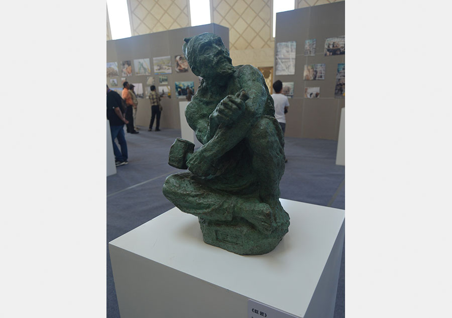 Sculptor He E's artworks highlight cultural expo in Ordos