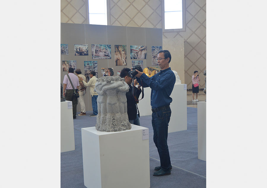 Sculptor He E's artworks highlight cultural expo in Ordos